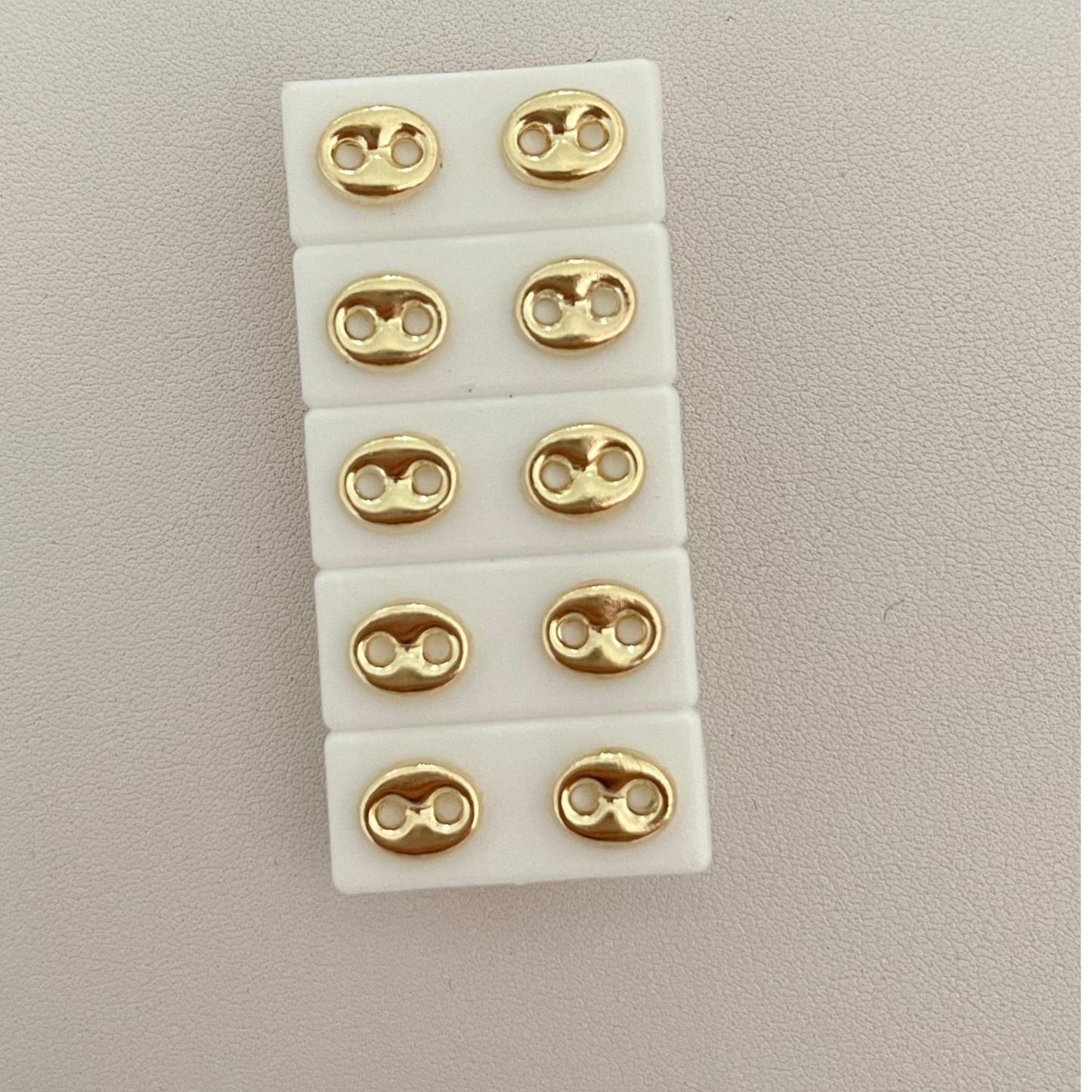 Topos Gucci en oro 18k – Estilo icónico y moderno