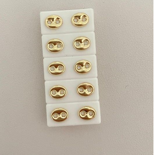 Topos Gucci en oro 18k – Estilo icónico y moderno
